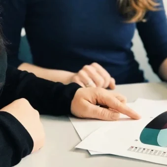 Cofounder pointing at a pie chart